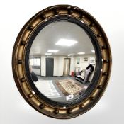 An early 20th century convex porthole mirror, 53 cm x 53 cm.