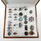 A group of twenty nine sterling silver and white metal dress rings