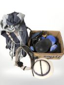 A ruck sack, pith helmet, riding helmet, dumbbells,