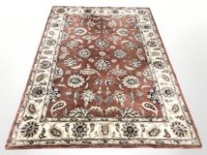 A machine made rug of Zeigler design 235 cm x 167 cm