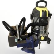 A Parkside wet and dry vacuum together with a vice