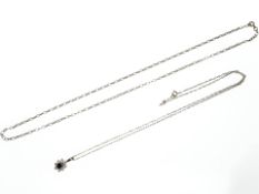 A 9ct yellow gold fine link chain and a further 9ct gold chain with pendant CONDITION