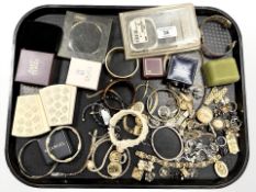 A group of costume jewellery, earrings, bangles,