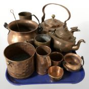 A group of copper kettles, tankards, swing handled cooking pot, etc.