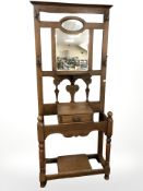 An Art Nouveau oak hall stand,