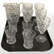 An American Fostoria glass pitcher, five goblets and four tumblers.