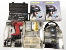 A Powerdevil electric drill in case, drill bit set,