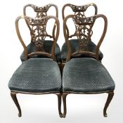 A set of six late Victorian mahogany salon chairs comprising two armchairs and four singles