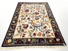 A 20th century machined floral rug,