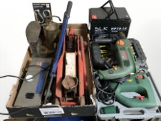 A hydraulic jack, cutters, electric drill screw driver set,
