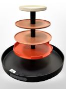 An Ikea PS Hylte 2006 multi-tiered circular serving stand, designed by Sunniva Kandell, in black,