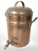 A copper twin handled keg with brass tap,
