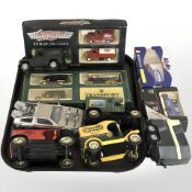 A group of boxed and unboxed die cast model cars, delivery vans, including Days Gone Vanguards,