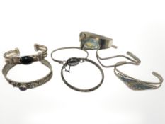 A group of silver and white metal jewellery, bracelets and bangles.