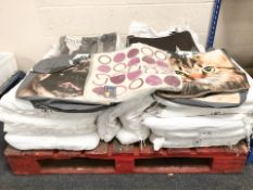 A large quantity of cushion covers,