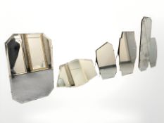 A group of six early 20th century frameless mirrors.