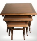 A contemporary nest of three tables,