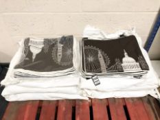A large quantity of London cushion covers