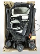 A camera bag containing Sony Alpha 700 and Alpha 350 digital cameras,