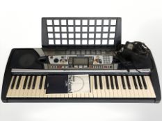 A Yamaha PSR-282 digital keyboard with lead.