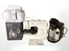 A Tassimo coffee machine, sewing machine,
