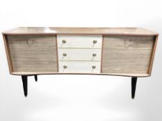 A 1960s melamine sideboard, 153 cm W x 44 cm D x 78 cm H.
