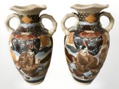 A pair of early 20th century Japanese crackle glazed earthenware vases,