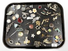 A group of costume brooches