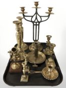 A brass candelabrum, three pairs of candlesticks, binnacle candlestick, etc.