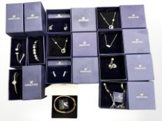 A group of Swarovski jewellery, bangles, necklaces etc in retail boxes.