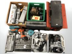 Several tool boxes containing spanner and socket sets, power tools,