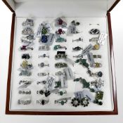 A group of forty silver and white metal dress rings and earrings