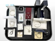 A group of silver and white metal jewellery, coin bracelet, Pandora ring,