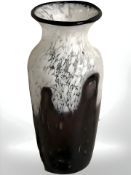 A two tone mottled and amethyst art glass vase, height 30 cm.