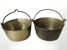 Two brass swing handled jam pans,