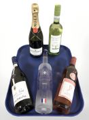 Five various bottles of alcohol : Moet & Chandon champagne, Pinot Grigio, Pinot Noir,