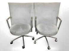 A pair of Danish Erik Jorgensen designed 'Partner' chrome-framed executive swivel armchairs,