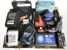 A group of power drills, spanner set, hydraulic jack,