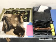 Assorted lady's hand bags, sheepskin rug,
