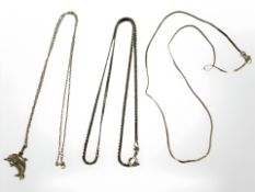 Two 9ct yellow gold necklaces together with a yellow metal necklace with dolphin pendant.