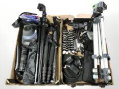 Several camera tripods, Fujifilm Instax 100 camera, Camray filters, Nikon and Kodak cameras,