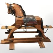 A modern wooden rocking horse,