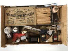 A collection of table lighters including novelty examples,