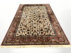 A machine-made carpet of Isphahan design,