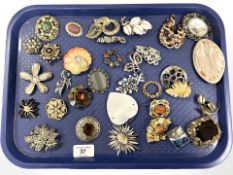 A group of costume brooches