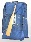 A Zodiak inflatable vessel with oars