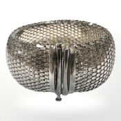 A sterling silver cuff bracelet, length 19.5 cm, width 30 mm. CONDITION REPORT: 49.