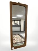 A 1970s teak framed mirror, approx 34 cm x 78 cm.