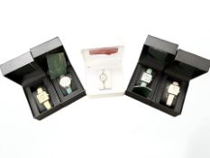 A group of watches including Four Gamages Skeleton Oasis Gent's watches and a further lady's watch