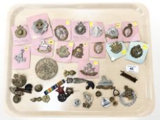 A group of badges, buttons and awards of military interest, commemorative medalion etc.